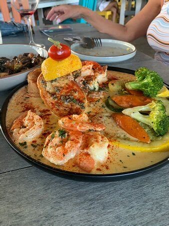 Viva south padre island - 6700 Padre Blvd.South Padre Island, TX 78597. This restaurant at the back of the Courtyard by Marriott hotel is a chain. It has the same high quality American bar food you’ll find at any Bar Louie — …